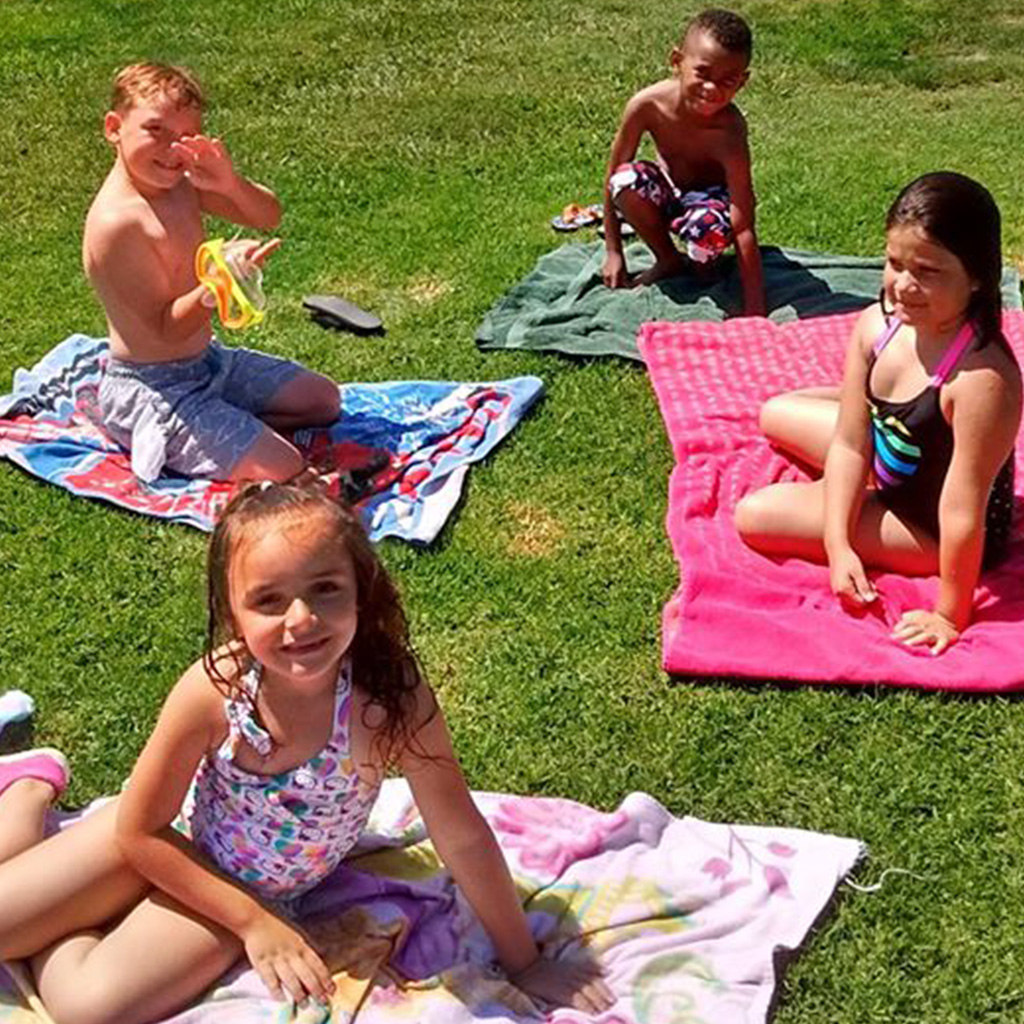 Rainbow Canyon Preschool Daycare students relax after a swim in Chino Ca. Inland Empire.
